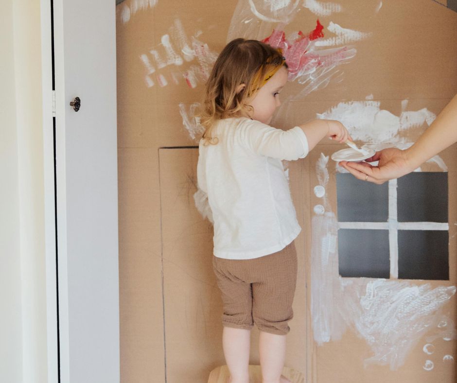 Preschool girl painting